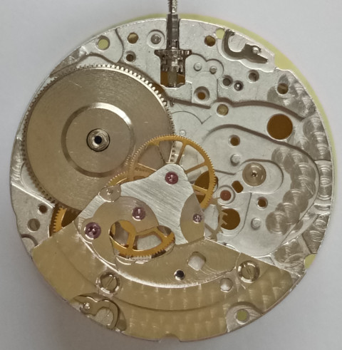 Base plate with gear train and barrel