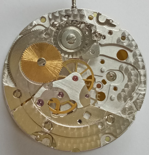 Gear train and barrel bridge